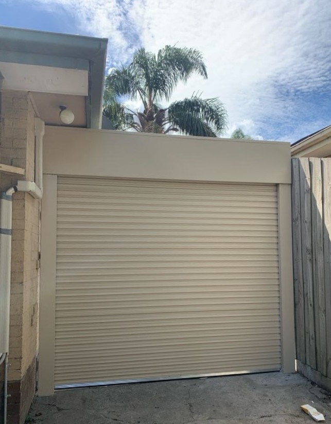 Taurean Roller Door, Colorbond Paperbark with Canopy