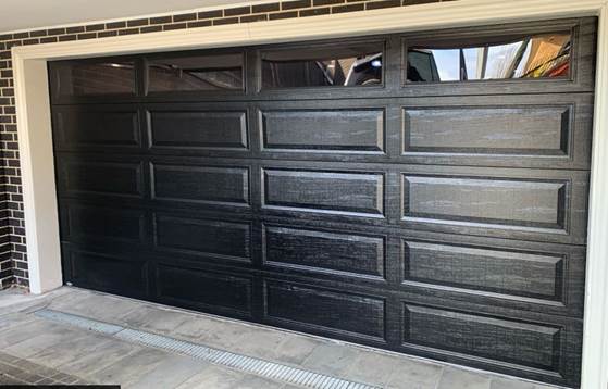 Steel Line Sectional Door, Colorbond Night Sky, Ranch Style with tinted windows