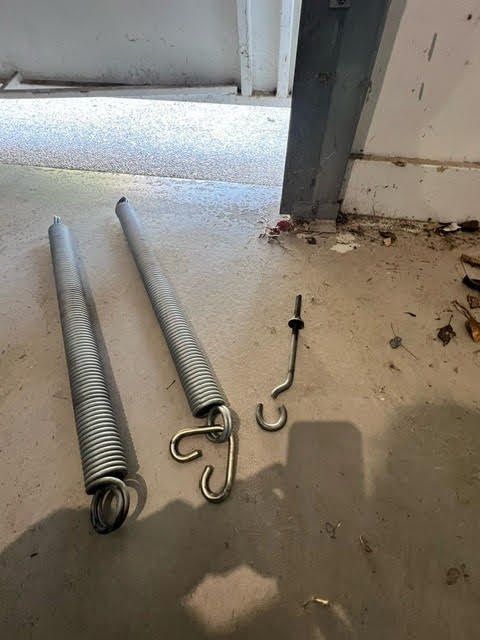 Broken Spring Hook Assembly - On Tilt T-Track Door